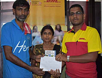 2017-04-07 07 08 18-DHL Staff Assist Family in Labasa Fiji Sun