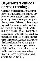 Bayer lowers outlook on weak earnings